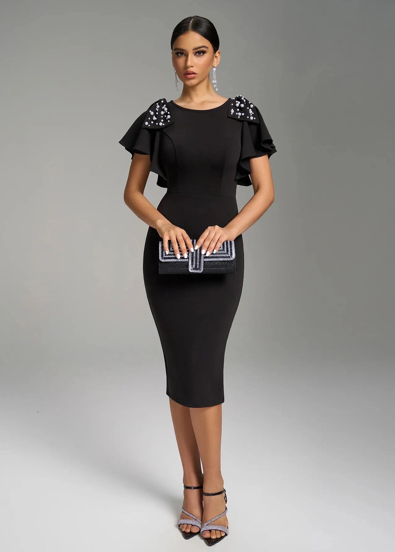 Robe fourreau noire chic