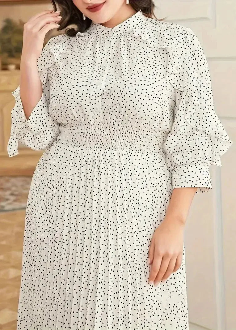 Robe blanche a pois noirs femme ronde
