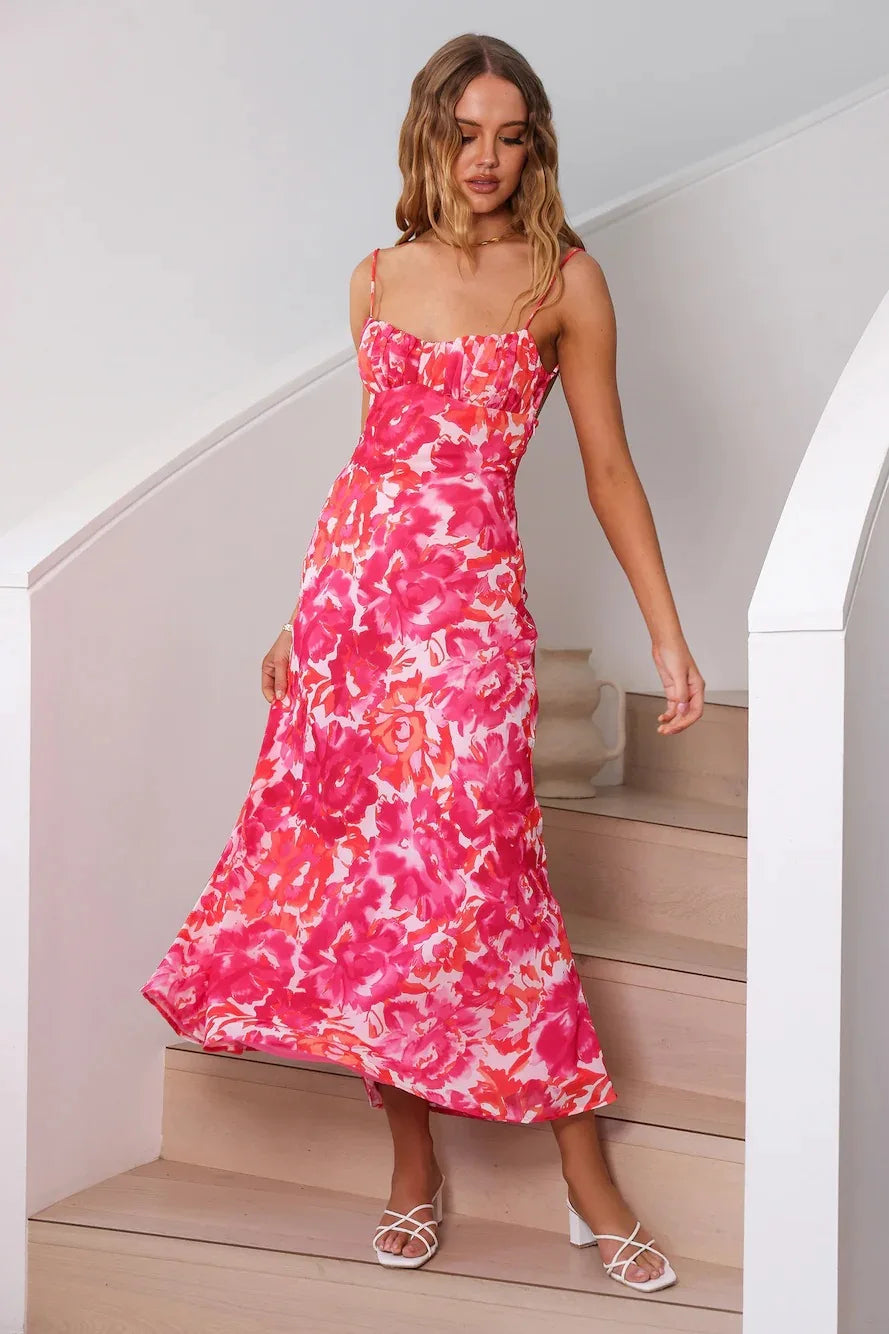 Robe longue rose à motifs