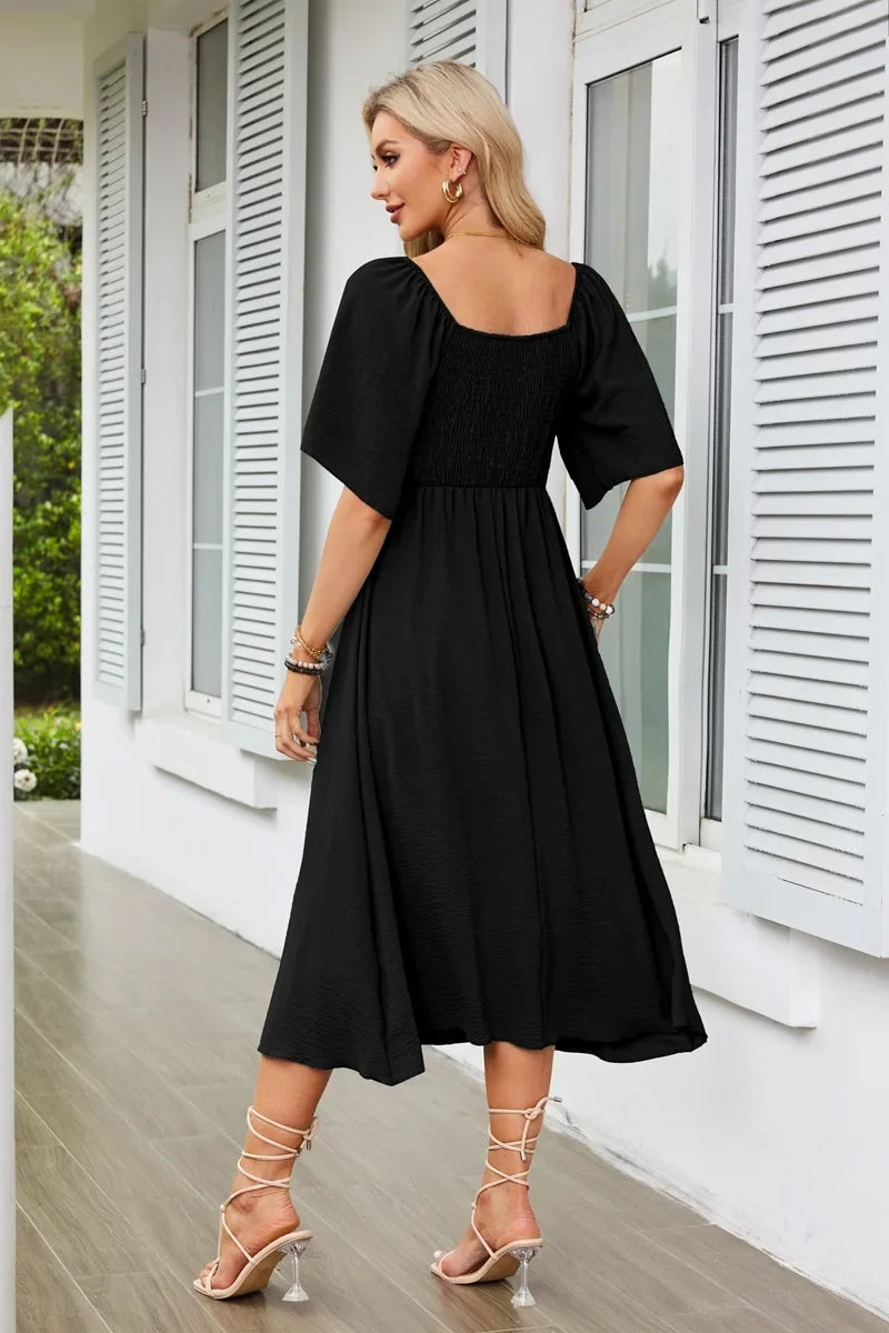 Robe noire fluide mi longue