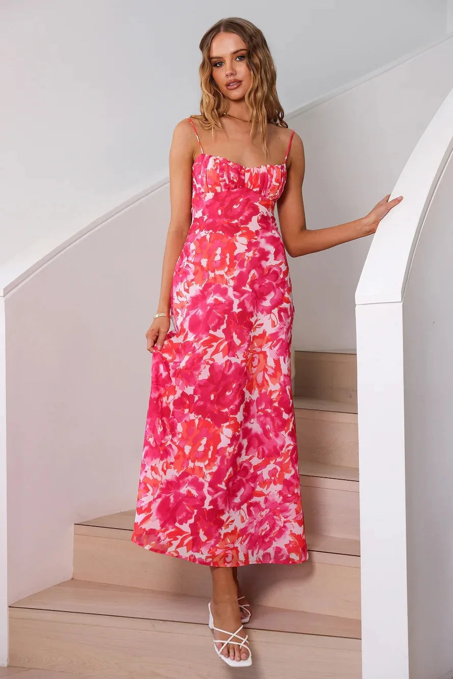 Robe longue rose à motifs
